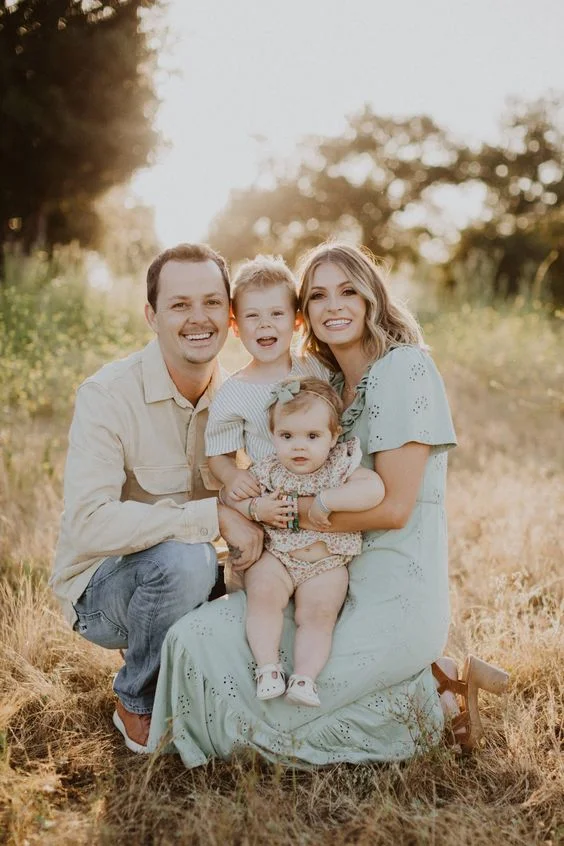 Family Poses For 4 With Baby